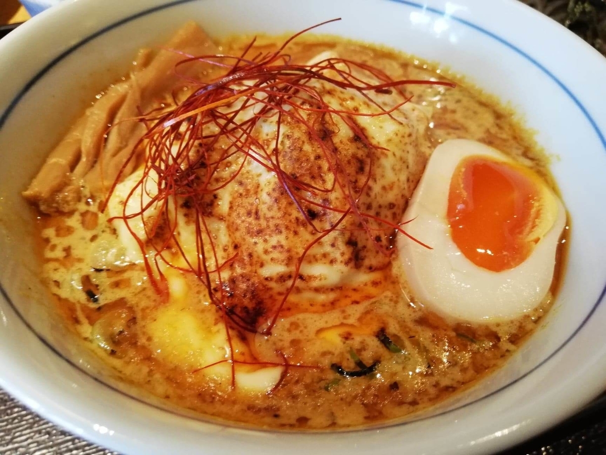 高田馬場『つけ蕎麦安土』の、カレーチーズの写真